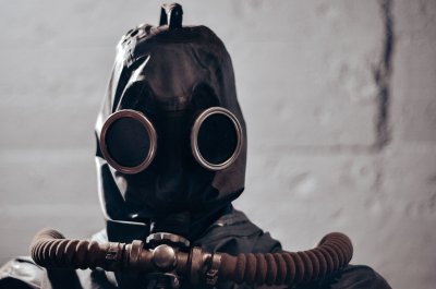 Protective suit and monitoring equipment used by nuclear test personnel, showing the type of safety gear deployed during radiation exposure scenarios